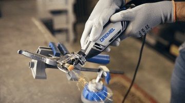 Багатофункціональний інструмент Dremel 4250 6-128, 128 насадок + 6 приставок