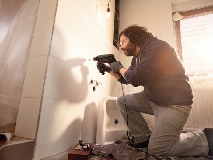 Дриль ударний Bosch UniversalImpact 700 X-line, 700Вт, ШЗП, 1.7кг, набір свердл і біт, кейс
