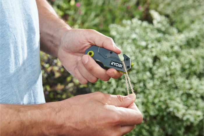 Ніж складаний Ryobi RFK25T, лезо 57мм, стропоріз, фіксатор леза, кліпса.
