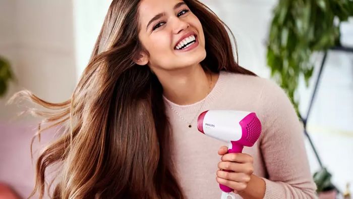 Фен Philips DryCare Essential дорожній, 1200Вт, 3 режими, хол. обдув, рожевий