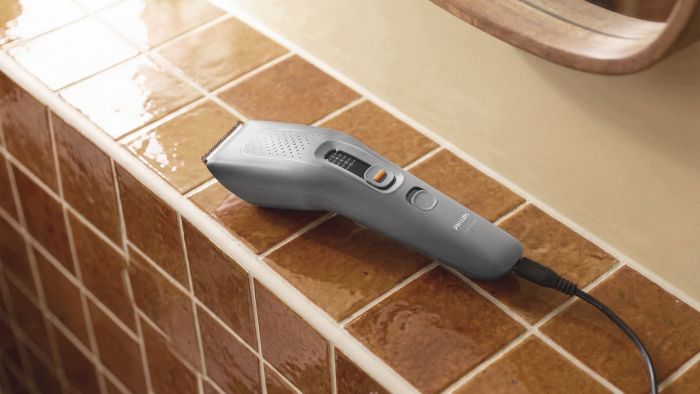 Машинка для стриження  Philips Series 3000, від мережі, роторний мотор, насадок-3, сухе чищення, сталь, сіра